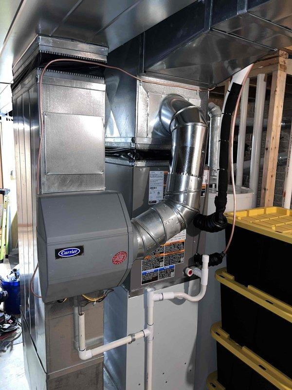 Completed installation of 2.5-ton air conditioning system with evaporator coil at rear yard location. Performed mechanical and electrical connections, executed system evacuation to proper vacuum levels as verified by digital gauge, and reconnected all refrigerant lines. System tested and operational with all components functioning within manufacturer specifications.