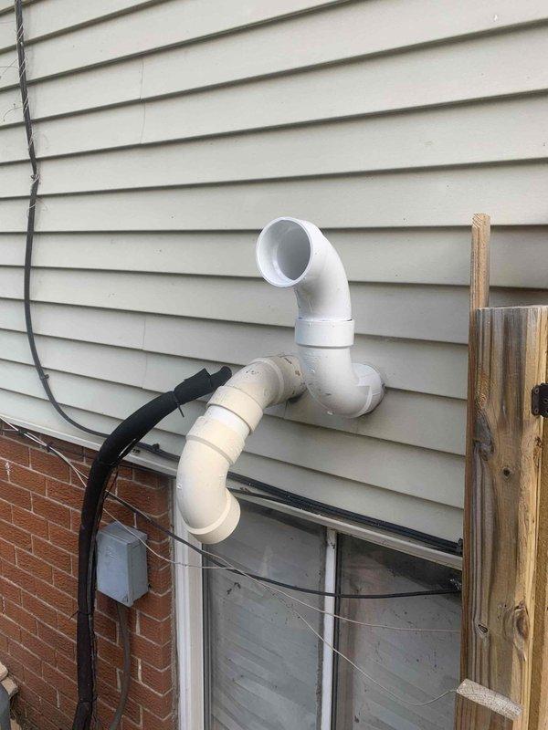 Completed callback for furnace installation to address code violation on exhaust venting system. Replaced cell core exhaust components with proper 3" PVC piping, ensuring all exhaust and intake venting meets current code requirements for the 70,000 BTU furnace unit. Verified proper termination of exterior vent pipes, secured all connections, and confirmed system operation and safe venting of combustion gases.