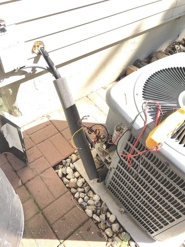 Completed preventative maintenance agreement visit for dual outdoor HVAC units under Club AC8-12 plan. Performed comprehensive inspection of both systems including electrical components, capacitor, contactor, and control wiring. All connections tested and found secure with proper voltage readings. Cleaned condenser coils, checked refrigerant line insulation, and verified proper drainage. Units operating within manufacturer specifications with no immediate repairs required. Documented equipment condition with photos showing unit #4015 internal components and exterior installation. System ready for continued seasonal operation.