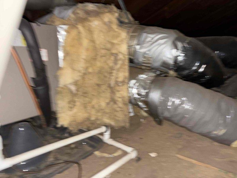 Conducted on-site evaluation of two residential air conditioning systems requiring replacement. First unit diagnosed with low refrigerant charge and determined economically unfeasible for repair due to age and condition of components. Second unit operational but running inefficiently with inadequate cooling performance. Inspected attic-mounted air handler, ductwork, and insulation conditions. Assessed exterior condenser units and electrical connections. Documented equipment specifications and existing system configuration. Provided comprehensive replacement estimate for both HVAC systems. Photographed attic mechanical components and exterior utility connections for documentation purposes.