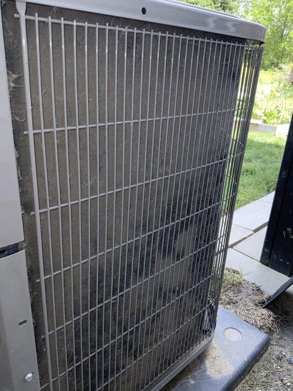 Responded to no cooling call where indoor fan was operating but outdoor unit had no power. Upon arrival, found outdoor condenser unit with heavily soiled coil fins showing significant accumulation of dust, debris, and grime affecting heat transfer efficiency. Opened electrical panel and performed diagnostic testing with multimeter to determine cause of power loss to outdoor unit. Identified failed capacitor as root cause preventing compressor and condenser fan operation. Replaced defective capacitor with proper rated component, verified all electrical connections, and tested system operation. Unit restored to normal cooling operation with compressor and outdoor fan running properly. Recommended coil cleaning service to restore optimal efficiency and heat transfer capability.