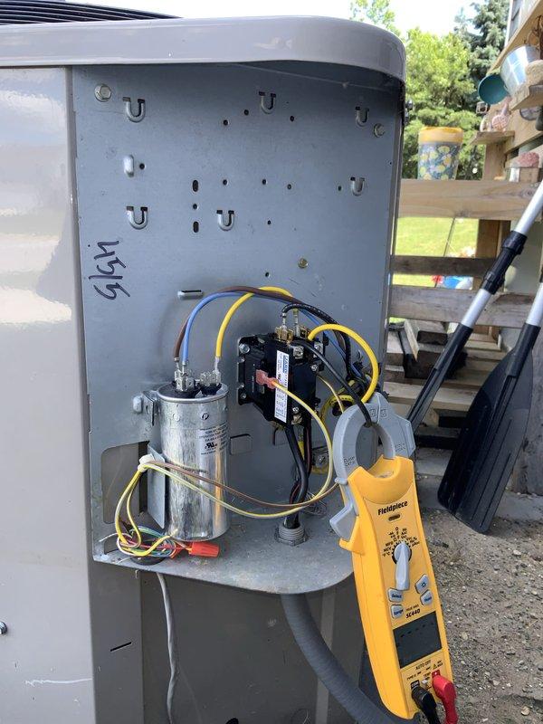 Responded to no cooling call where indoor fan was operating but outdoor unit had no power. Upon arrival, found outdoor condenser unit with heavily soiled coil fins showing significant accumulation of dust, debris, and grime affecting heat transfer efficiency. Opened electrical panel and performed diagnostic testing with multimeter to determine cause of power loss to outdoor unit. Identified failed capacitor as root cause preventing compressor and condenser fan operation. Replaced defective capacitor with proper rated component, verified all electrical connections, and tested system operation. Unit restored to normal cooling operation with compressor and outdoor fan running properly. Recommended coil cleaning service to restore optimal efficiency and heat transfer capability.
