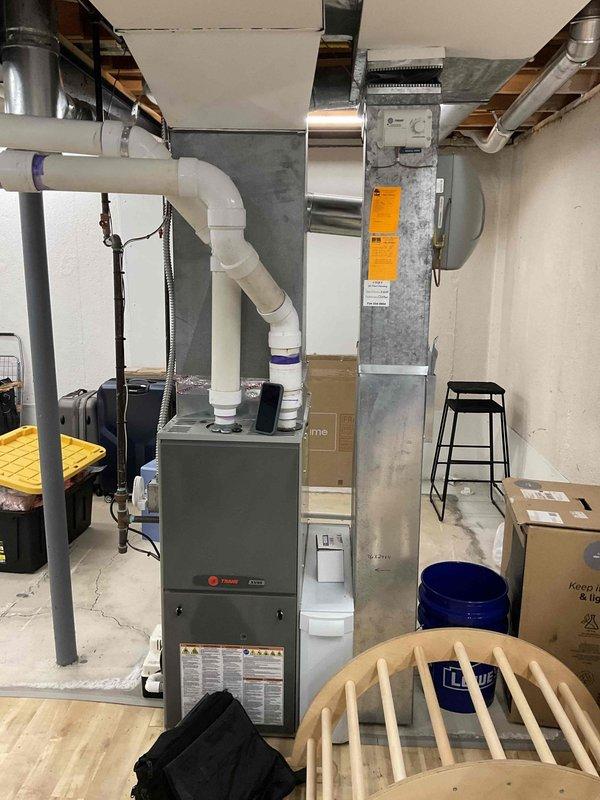 Performed complimentary estimate for replacement of 30-year-old air conditioning system. Evaluated existing HVAC infrastructure in basement including furnace unit, ductwork configuration, and copper refrigerant lines. Documented current equipment condition and photographed mechanical room layout to develop comprehensive replacement proposal for new AC installation.
