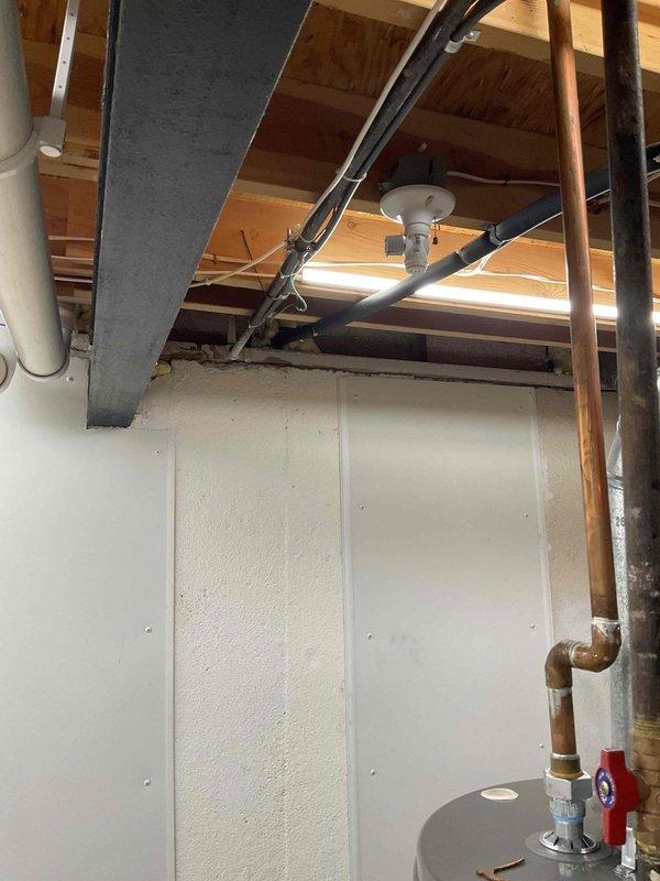 Performed complimentary estimate for replacement of 30-year-old air conditioning system. Evaluated existing HVAC infrastructure in basement including furnace unit, ductwork configuration, and copper refrigerant lines. Documented current equipment condition and photographed mechanical room layout to develop comprehensive replacement proposal for new AC installation.