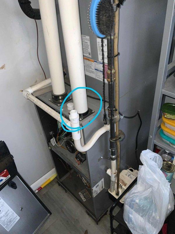 # HVAC Service Call - No Cooling Issue

Responded to service call for non-operational air conditioning system and thermostat. Upon arrival, discovered condensate drain line obstruction preventing system operation due to safety float switch activation. Cleared blockage from condensate drain line, verified proper drainage flow, and tested system operation. Unit restored to normal cooling function with thermostat responding appropriately to temperature settings.