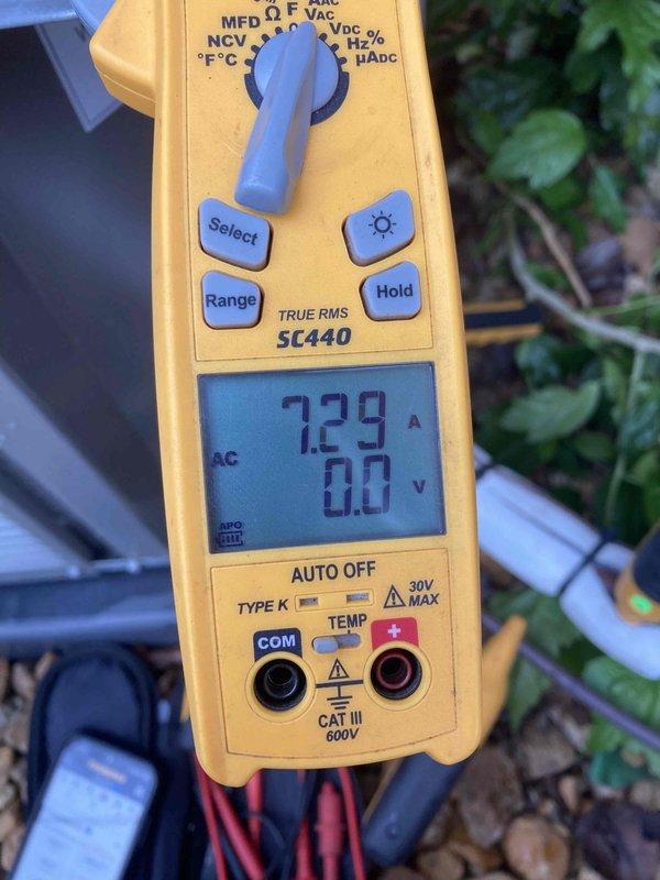 Completed preventive maintenance agreement visit on dual-system air conditioning setup. Performed electrical diagnostics on both units using digital multimeter to verify amperage draw and voltage readings on compressor circuits. Measured operating amperage at 7.29A and conducted voltage tests showing 0.0V on one circuit, along with additional readings of 43.96 on control voltage circuits. Inspected and tested HVAC control panel wiring connections, including relay components and multi-conductor control wiring. All electrical connections were verified for proper operation and system functionality was confirmed upon completion of maintenance procedures.