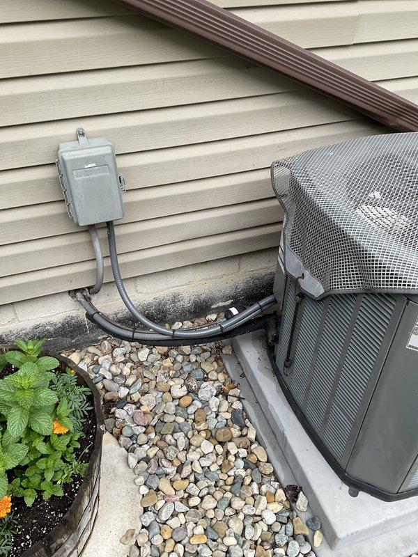 Conducted comprehensive evaluation of existing HVAC system for replacement estimate. Assessed indoor air handler unit with associated ductwork, humidifier accessory, and electrical components in mechanical room, as well as outdoor condenser unit with protective screening. Documented current equipment configuration, installation conditions, and photographed all components to provide accurate replacement specifications and pricing proposal.