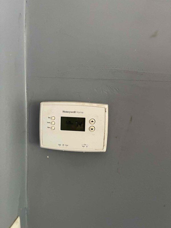 Responded to service call for non-operational AC system serving zones 4-6. Performed comprehensive assessment of existing HVAC equipment and thermostat controls, documented current system configuration including Honeywell Home thermostat and basement mechanical room layout with existing ductwork, electrical connections, and plumbing infrastructure. Provided complete replacement estimate for new equipment installation to restore cooling capacity to affected zones.