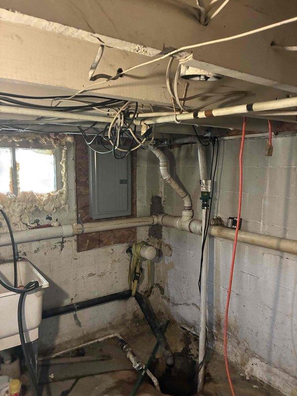 Responded to service call for non-operational AC system serving zones 4-6. Performed comprehensive assessment of existing HVAC equipment and thermostat controls, documented current system configuration including Honeywell Home thermostat and basement mechanical room layout with existing ductwork, electrical connections, and plumbing infrastructure. Provided complete replacement estimate for new equipment installation to restore cooling capacity to affected zones.