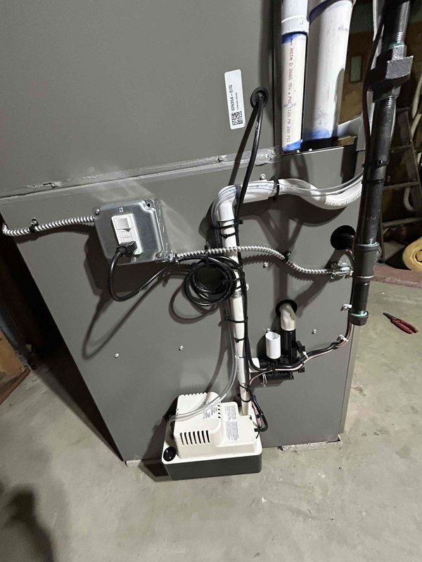 Completed full HVAC system installation including 70,000 BTU gas furnace, 2-ton air conditioning unit, and whole-home humidifier. Installed all required ductwork with proper insulation, ran condensate drainage system with pump, and completed electrical connections including disconnect and thermostat wiring. All equipment tested and operational upon completion, with financing documentation processed and signed.