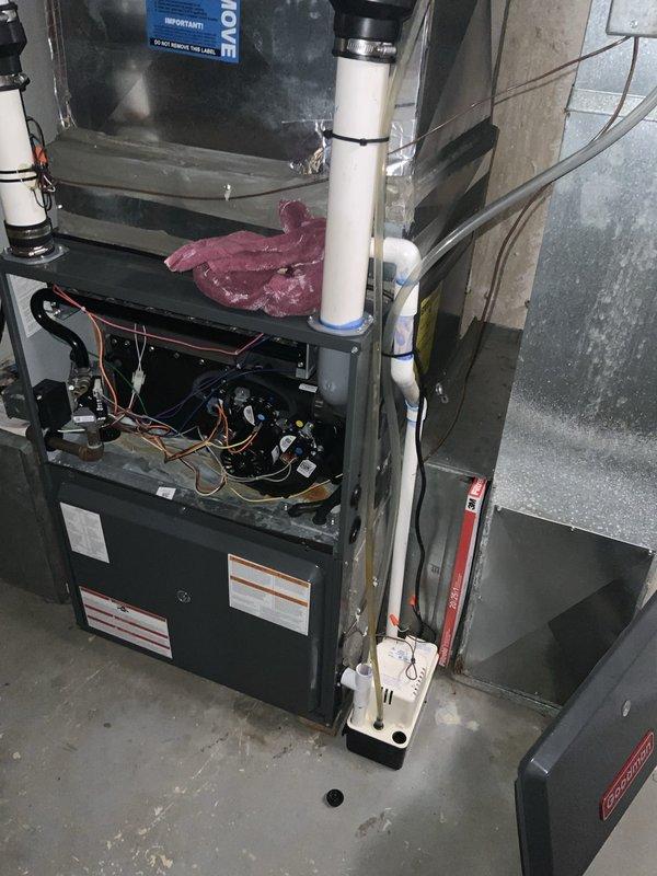 Responded to no cool call with air conditioning running continuously and not responding to thermostat commands. Upon arrival, accessed furnace control panel and inspected system components including circuit board, wiring connections, and control module. Identified communication failure between thermostat and HVAC control board preventing proper system cycling. Verified all electrical connections, tested control voltage, and restored proper thermostat communication to resolve continuous run condition and restore normal cooling operation.