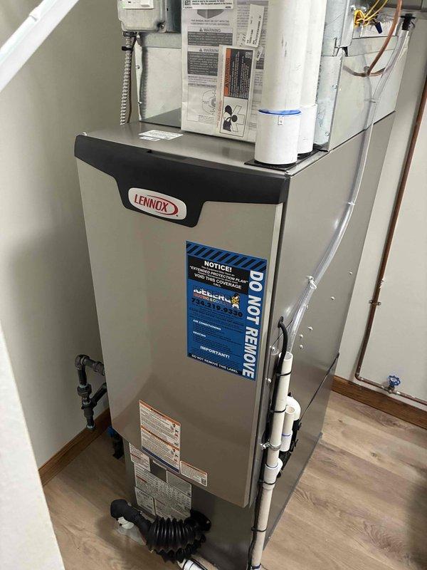 Completed full HVAC system installation including a Lennox 70,000 BTU furnace with 2-ton rear-discharge air conditioning unit. Installed whole-home humidifier and reconnected all mechanical and electrical components to existing infrastructure. Performed system evacuation and pressure testing, achieving proper vacuum levels of 10.68 as verified with digital micron gauge. All ductwork connections secured, PVC condensate drainage installed, and refrigerant lines properly connected and tested. System commissioned and verified operational per manufacturer specifications.