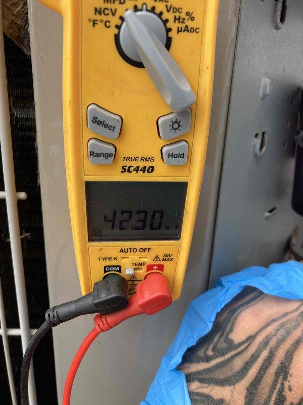 Performed routine preventive maintenance on air conditioning system as part of club agreement service. Conducted comprehensive system diagnostics using digital multimeter to verify electrical parameters and system performance, measuring voltage and temperature readings to ensure proper operation. Unit inspected and found operating within normal specifications.