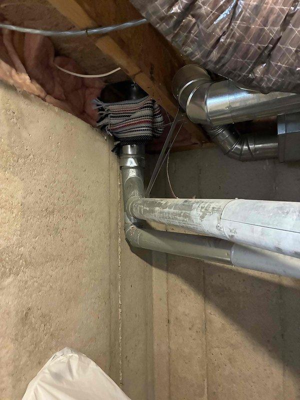 Conducted estimate for air conditioning replacement at property with 21-year-old natural gas furnace currently non-operational. Assessed basement mechanical room containing existing HVAC equipment, ductwork configuration, and utility connections including water heater proximity to determine replacement specifications. Documented existing system layout, available clearances, and installation requirements for complete AC system replacement proposal.