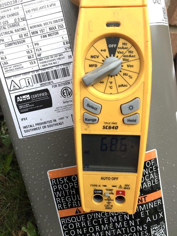 Completed AC Club preventive maintenance agreement visit on outdoor condensing unit. Performed comprehensive system inspection including electrical testing with digital multimeter to verify proper voltage and capacitance readings, visual assessment of condenser coil condition noting exterior weathering and biological growth on lower fins, and verification of refrigerant line connections and unit mounting stability on concrete pad.