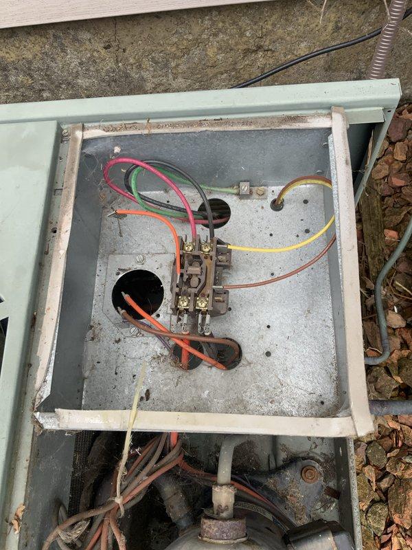 # HVAC Service Completion Report

Responded to no cooling complaint on 10+ year old air conditioning system. Upon arrival, performed diagnostic evaluation of outdoor condensing unit and associated electrical components. 

Inspection revealed failed contactor assembly preventing compressor and condenser fan operation. Contactor showed significant aging, corrosion on terminal connections, and carbon buildup on contact points consistent with extended service life. Electrical connections at contactor displayed discoloration and oxidation. Disconnect box examination showed aged wiring with weathered insulation throughout electrical pathway.

Replaced defective contactor with new OEM-equivalent component rated for system specifications. Cleaned and tightened all electrical terminations at contactor mounting location and disconnect box. Verified proper voltage supply at disconnect. Energized system and confirmed compressor and condenser fan motor startup. Monitored unit through complete cooli