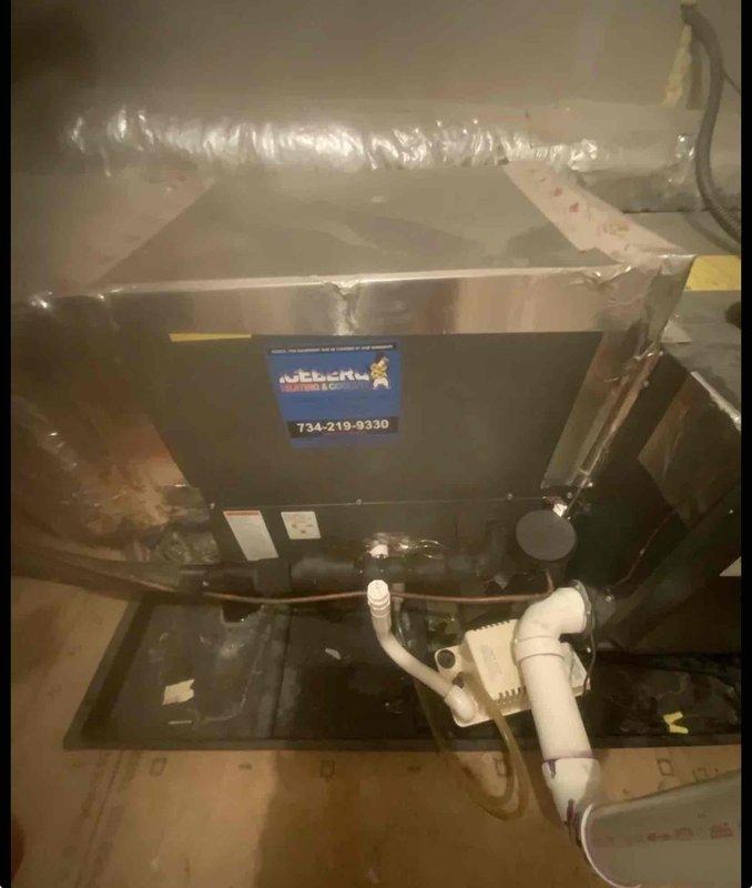# HVAC Service Report

Responded to emergency no-cooling call for five-year-old air conditioning system. Upon arrival, performed comprehensive diagnostic testing using digital manifold gauges to measure system pressures and temperatures across both indoor evaporator coil and outdoor condensing unit. Readings indicated abnormal operating conditions requiring immediate attention.

Inspected indoor air handler unit located in attic space, noting Weber-branded equipment with proper drainage system and condensate management in place. Verified unit accessibility and examined all visible components for signs of failure or malfunction. Connected diagnostic equipment to service ports on outdoor condenser unit to obtain live refrigerant pressure and temperature data.

Digital manifold readings revealed system operating parameters outside normal range, with pressure measurements indicating potential refrigerant charge issues or mechanical failure preventing proper heat transfer. Analyzed superhea