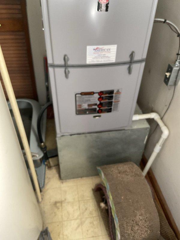 Performed on-site evaluation of existing HVAC system with R-22 refrigerant. Determined existing air conditioning unit was low on refrigerant and not economically viable for repair due to age and refrigerant phase-out. Documented current furnace installation and exterior electrical service configuration. Provided estimate for complete air conditioning system replacement with modern, environmentally-compliant equipment. Photographed existing equipment and utility connections for replacement planning purposes.