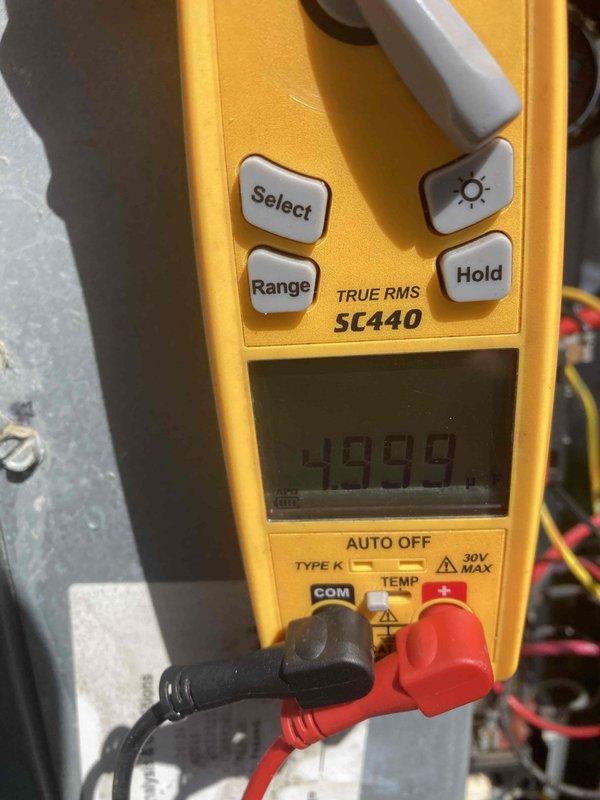 Performed routine maintenance agreement visit for air conditioning system. Replaced defective set screw on gas valve assembly, utilizing easy-out tool to extract damaged original screw before installing new hardware. Conducted electrical diagnostics with multimeter to verify proper system operation and confirm gas valve functionality following repair.