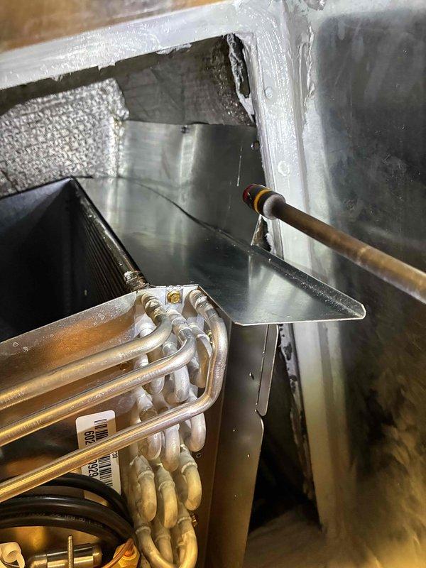 Successfully completed installation of a 3-ton air conditioning system with matching evaporator coil in rear-discharge configuration. Performed all mechanical and electrical connections, including refrigerant line installation with proper brazing techniques, reconnection of existing ductwork, and final system startup to verify proper operation.