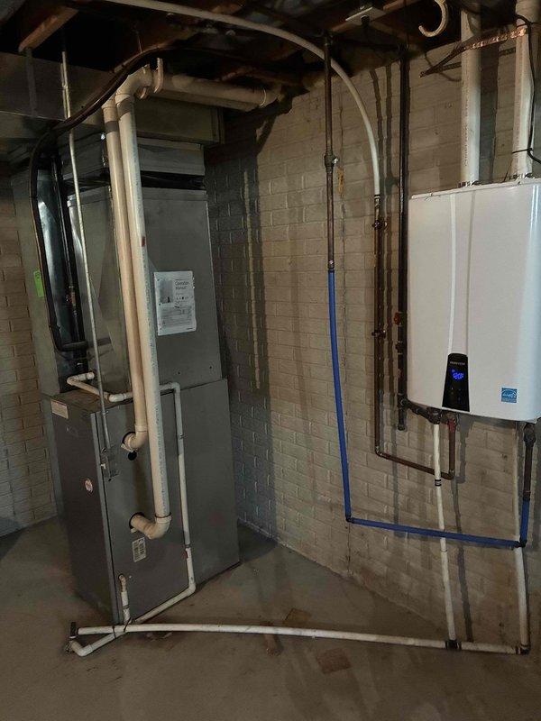 Conducted comprehensive assessment of existing HVAC system for replacement estimate. Evaluated gray metal air handler unit and associated ductwork in basement mechanical room. Inspected electrical panel to verify circuit capacity and breaker configuration for furnace and air conditioning power requirements. Documented current equipment specifications, installation conditions, and electrical infrastructure. Photographed existing air handler, PVC condensate drainage, electrical panel with labeled circuits including dedicated furnace and A/C breakers, and basement mechanical room layout to prepare itemized quotes for individual furnace replacement, air conditioning system replacement, and bundled furnace and AC replacement package.