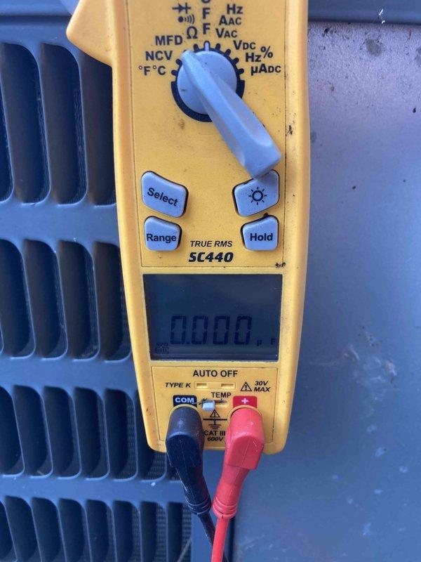 Responded to no cooling call on air conditioning unit. Upon arrival, performed diagnostic testing using digital multimeter to check electrical components. Inspected capacitor and associated wiring connections, noting accumulated dust and debris within the unit. Tested voltage and capacitance levels to determine system functionality and identified the root cause of the cooling failure.