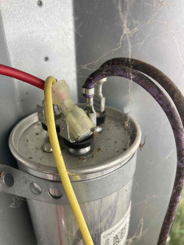 Responded to no cooling call on air conditioning unit. Upon arrival, performed diagnostic testing using digital multimeter to check electrical components. Inspected capacitor and associated wiring connections, noting accumulated dust and debris within the unit. Tested voltage and capacitance levels to determine system functionality and identified the root cause of the cooling failure.