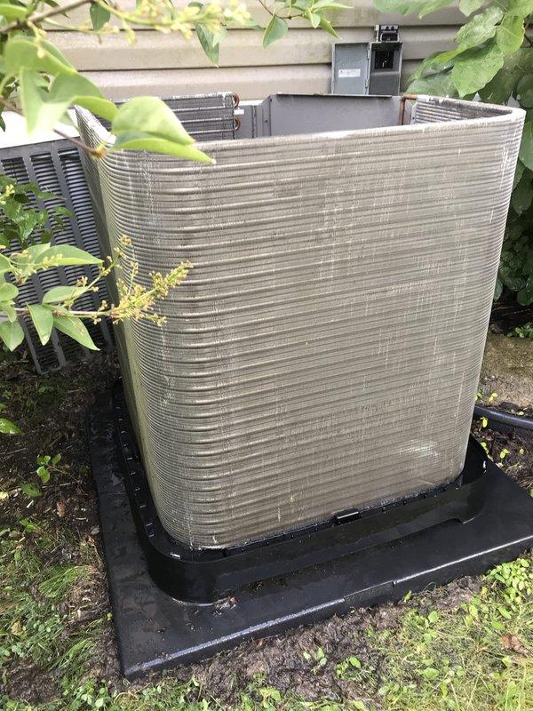 Responded to no cooling complaint on residential air conditioning system. Upon arrival, found outdoor condenser unit operational but covered in debris and dirt accumulation affecting airflow efficiency. Cleaned condenser coil fins and removed vegetation growth around unit perimeter. Inspected refrigerant lines and electrical connections for proper operation. System tested and confirmed adequate cooling performance restored after cleaning and maintenance procedures completed.