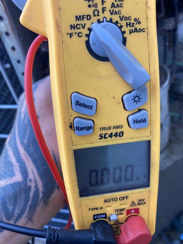 Responded to no-cooling complaint on 10+ year old air conditioning system. Upon arrival, confirmed outdoor fan motor was not operating while compressor attempted to run. Used digital multimeter to diagnose failed condenser fan motor. Replaced defective fan motor and verified proper system operation with all components running within normal parameters.