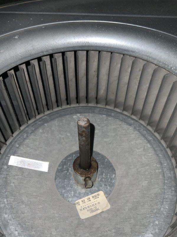 Responded to no-cool call on 30-year-old AC unit that had frozen up and produced unusual noise before being shut down. Upon arrival, inspected outdoor condenser unit and found electrical components requiring attention, including capacitor and contactor connections. Examined blower assembly and noted corrosion on motor shaft, indicating age-related deterioration consistent with unit's service life. Documented internal electrical panel condition with tangled wiring and multiple connections to capacitor. Given the advanced age of the system and extent of wear observed, provided customer with assessment of current condition and recommended replacement options, as repair costs would not be cost-effective for equipment at end of expected lifespan.