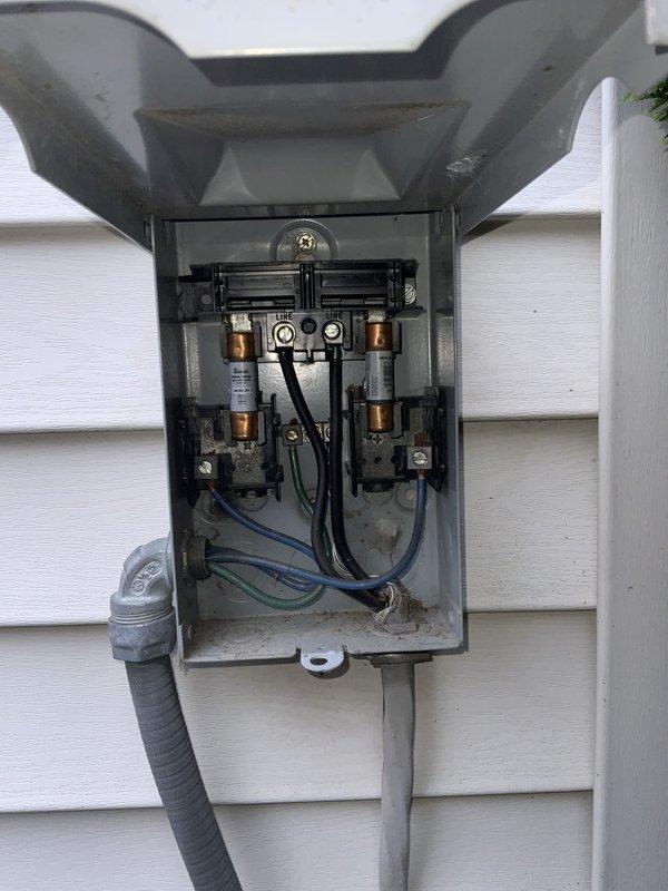 Responded to no-cooling call and found AC system completely off with no power to outdoor unit. Inspected electrical disconnect box and discovered blown fuses preventing system operation. Replaced failed cartridge fuses and restored power to condensing unit. Verified proper voltage supply, confirmed blower motor operation, and tested system startup sequence. Unit returned to normal cooling operation with all components functioning properly.