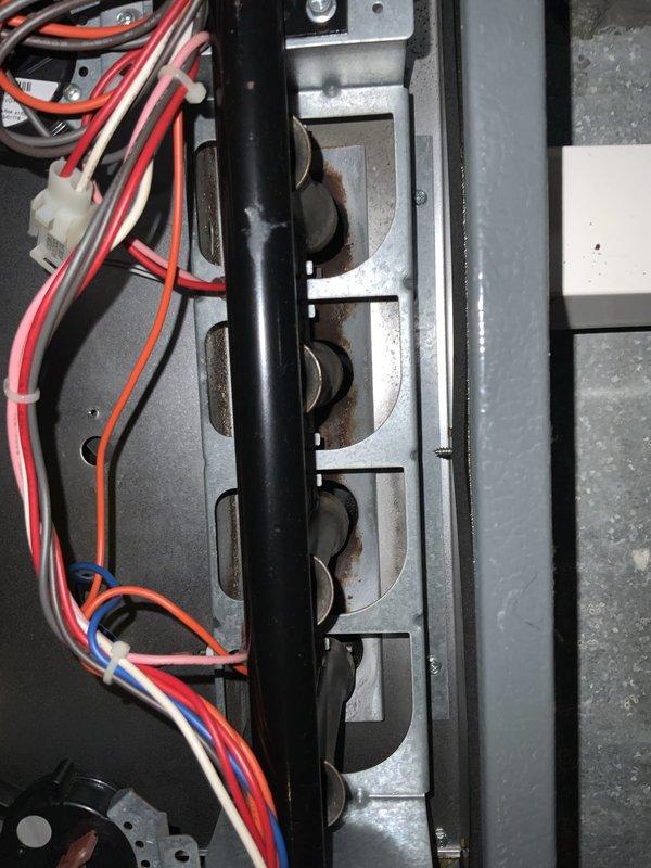 Responded to no cooling complaint on residential HVAC system. Upon inspection, found unit blowing warm air through vents. Accessed electrical control panel and blower assembly to diagnose issue. Inspected capacitor, wiring connections, and blower wheel condition. Blower wheel showed dust accumulation on fins which can restrict airflow and reduce system efficiency. Electrical connections at terminal block appeared intact with proper wire management. System components showed normal wear consistent with age of equipment. Addressed cooling failure and restored proper operation.