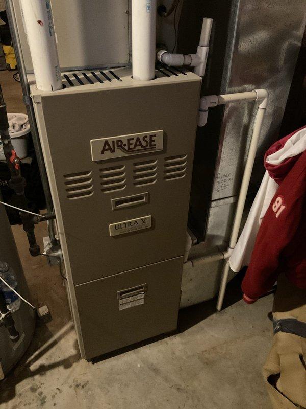 Conducted on-site evaluation of existing AirEase Ultra V furnace system in basement mechanical room to provide replacement estimate options. Assessed current HVAC equipment configuration, including furnace unit, PVC condensate drainage lines, and ductwork connections. Documented electrical service panel capacity and breaker configuration to determine compatibility requirements for proposed system upgrades. Photographed existing equipment and infrastructure to develop comprehensive quote for both complete HVAC system replacement and air conditioning-only installation options.