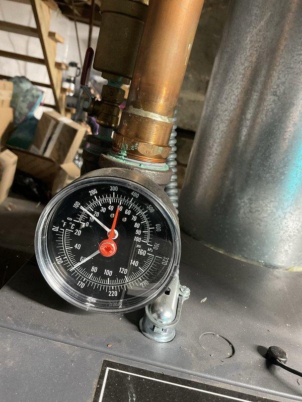 Completed preventive maintenance tune-up on two-year-old boiler system. Performed comprehensive inspection of all mechanical and electrical components, verified pressure gauge readings within normal operating parameters, checked all gas line connections and fittings for proper operation, inspected wiring harnesses and electrical connections throughout the unit, and confirmed all safety controls and valves functioning correctly. Unit operating efficiently with no issues found.