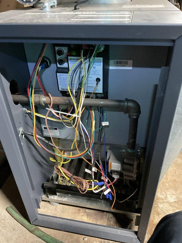Completed preventive maintenance tune-up on two-year-old boiler system. Performed comprehensive inspection of all mechanical and electrical components, verified pressure gauge readings within normal operating parameters, checked all gas line connections and fittings for proper operation, inspected wiring harnesses and electrical connections throughout the unit, and confirmed all safety controls and valves functioning correctly. Unit operating efficiently with no issues found.