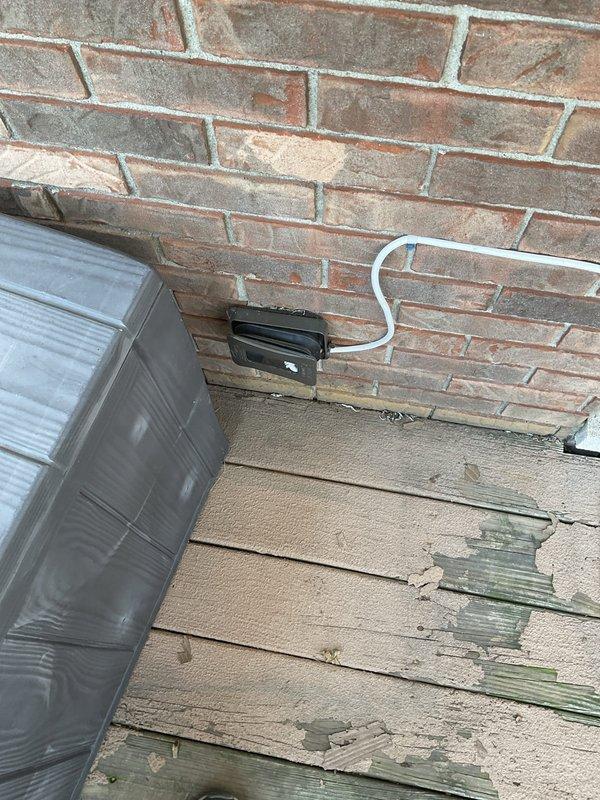 # Electrical Estimate - Generator Installation

Conducted comprehensive site assessment for whole home standby generator installation and air conditioning unit replacement. Evaluated existing electrical service infrastructure, including dual utility meter configuration and current disconnect panel mounted on brick exterior wall. Documented weathered deck area adjacent to existing HVAC equipment location, noting proximity to electrical service connection point with existing conduit and receptacle. Assessed accessibility for generator placement considering clearance requirements from structure, existing AC unit positioning, and electrical service entry points. Evaluated electrical panel capacity and determined requirements for automatic transfer switch installation, load calculations, and necessary permits. Photographed meter base location, service disconnect, and proposed equipment placement areas to develop accurate material list and labor estimate for generator system integration with
