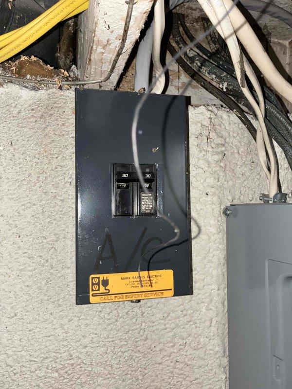 Completed on-site evaluation for air conditioning system replacement. Current system operational but running low on R22 refrigerant, indicating age and impending phase-out concerns. Documented existing electrical infrastructure including main breaker panel and disconnect box to assess compatibility with new equipment installation requirements. Provided comprehensive estimate for complete AC system replacement with modern refrigerant-compliant unit.