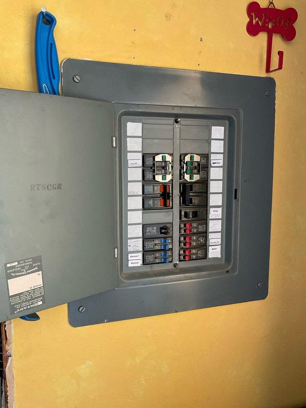 Conducted on-site evaluation for mini split system installation serving 2-4 zones. Assessed electrical infrastructure at main service panel to verify adequate capacity and breaker availability for new equipment. Documented existing conditions in proposed installation area, including available wall space, structural considerations, and clearance requirements for indoor and outdoor unit placement. Photographed electrical panel configuration and installation location to support equipment sizing recommendations and installation planning.