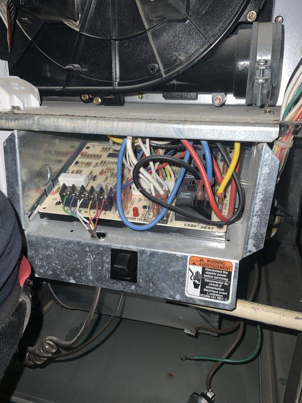 Responded to no cooling call on 16+ year old system. Upon inspection, found blower assembly required attention due to dust accumulation and age-related wear, and control board showed signs of operational stress with multiple wire connections requiring verification. Documented internal components including blower wheel, motor assembly, and electrical control board for service records.