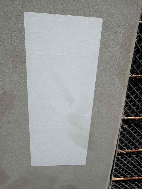 Responded to no-cool call on 9-year-old central air conditioning system. Upon arrival, confirmed unit was not providing cooling to the residence. Documented equipment information from manufacturer data plate on furnace unit (Model: DGAT090BDF, Serial: 990413227, 90,000 BTU/Hr input natural gas forced air furnace). Photographed system components and insulation board near HVAC equipment for service records.