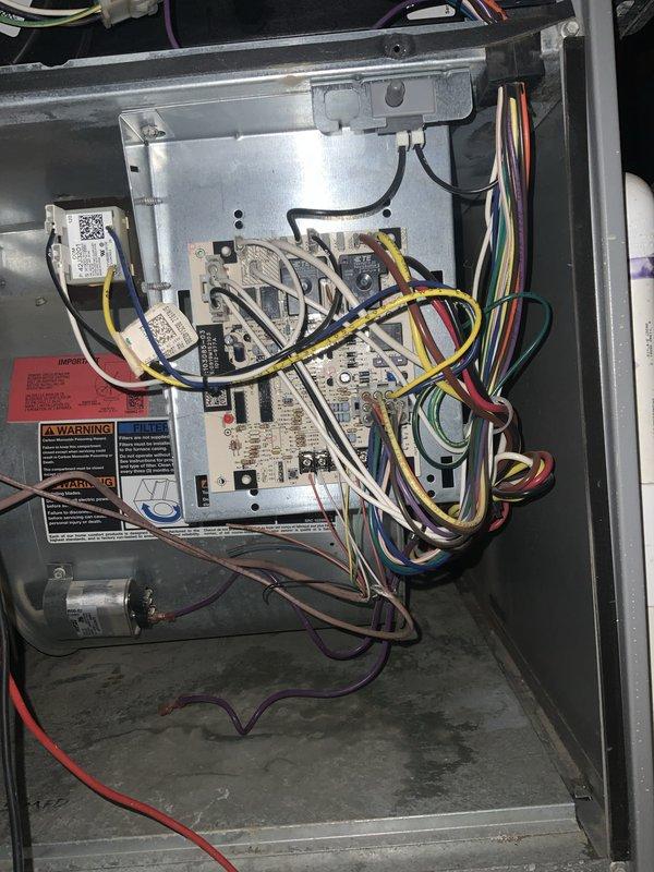 Responded to no cooling complaint on residential air conditioning system. Upon inspection, accessed control panel and evaluated electrical components, circuit board connections, and capacitor. Photographed system components and unit identification for service documentation. System components appeared properly mounted and wired with all connections intact at time of inspection.