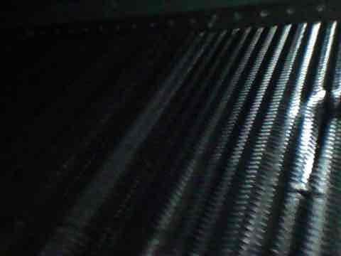 Responded to warranty call for 201 IU Blower Motor Fault on system 2-6. Upon inspection, discovered active refrigerant leak at valve connection point with visible spray discharge. Performed leak detection and identified compromised connection requiring immediate attention. Inspected evaporator coil fins and confirmed clean condition with no debris obstruction or damage to heat exchanger surfaces. Addressed refrigerant system integrity issue and restored proper operation to resolve fault code.