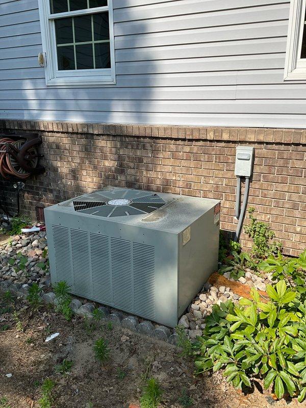 Completed HVAC system evaluation for replacement estimate on 33-year-old residential air conditioning condenser and furnace installation. Both units dating from 1993 showed significant age-related wear but no immediate operational failures reported. Assessed outdoor condenser unit condition, documented existing equipment specifications, and provided replacement options including promotional upgrade package for complete system replacement of both cooling and heating equipment.