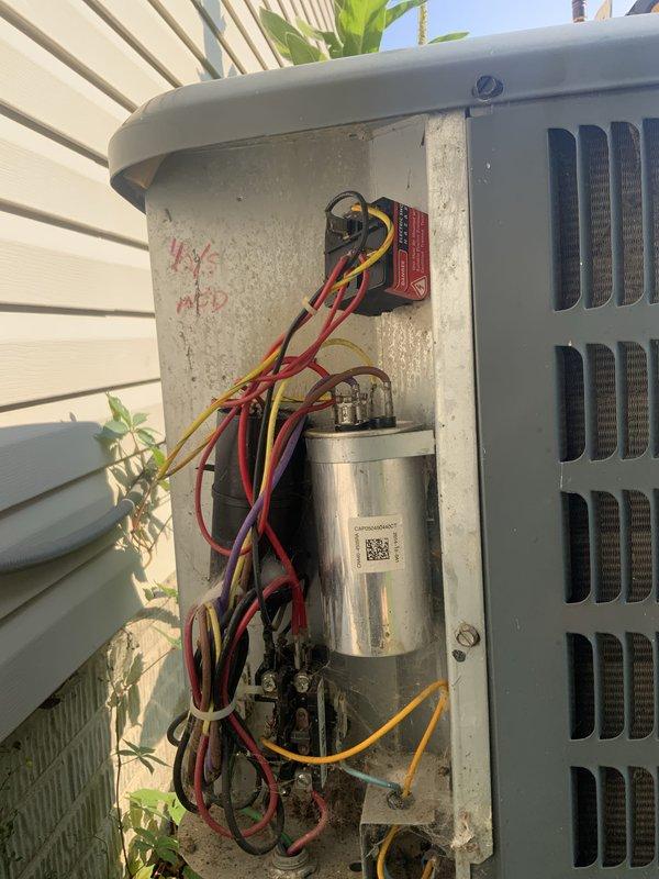 # AC Not Turning On After Power Outage

Responded to no-cooling call following power outage. Upon arrival, found outdoor condensing unit not energizing. Removed access panel and inspected electrical components. Located failed dual run capacitor preventing compressor and condenser fan motor operation. Capacitor showed visible signs of failure and tested out of specification with multimeter. 

Replaced defective capacitor with manufacturer-approved replacement matching correct microfarad and voltage ratings. Verified all electrical connections secure and properly terminated. Restored power and tested system operation. Confirmed compressor and condenser fan motor engaging properly with correct amperage draw on both circuits.

Proceeded to indoor air handler for routine inspection during service call. Removed and inspected air filter, which showed moderate dust accumulation. Checked blower motor operation and verified proper airflow through evaporator coil. All indoor components functionin