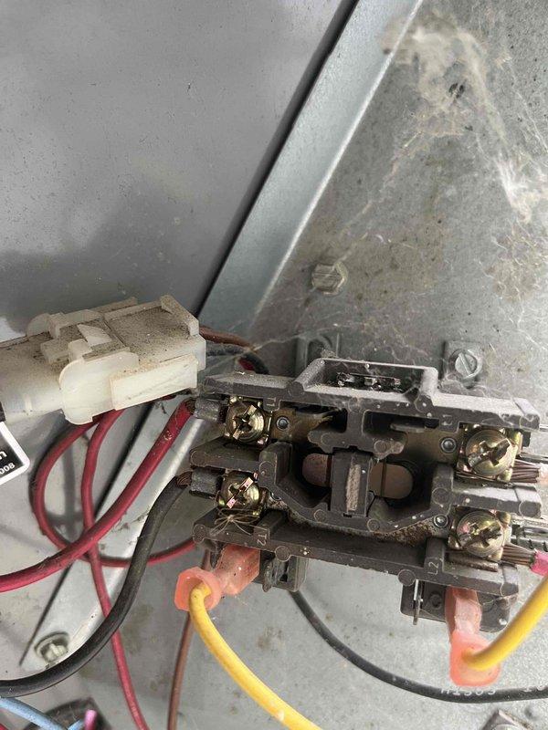 Completed scheduled HVAC maintenance agreement visit for ongoing cooling system service. Performed inspection of electrical components including contactor assembly, wiring connections, and terminal blocks, documenting equipment condition with photos showing normal operational wear and dust accumulation on components. All electrical connections verified secure with proper wire routing maintained throughout the system.