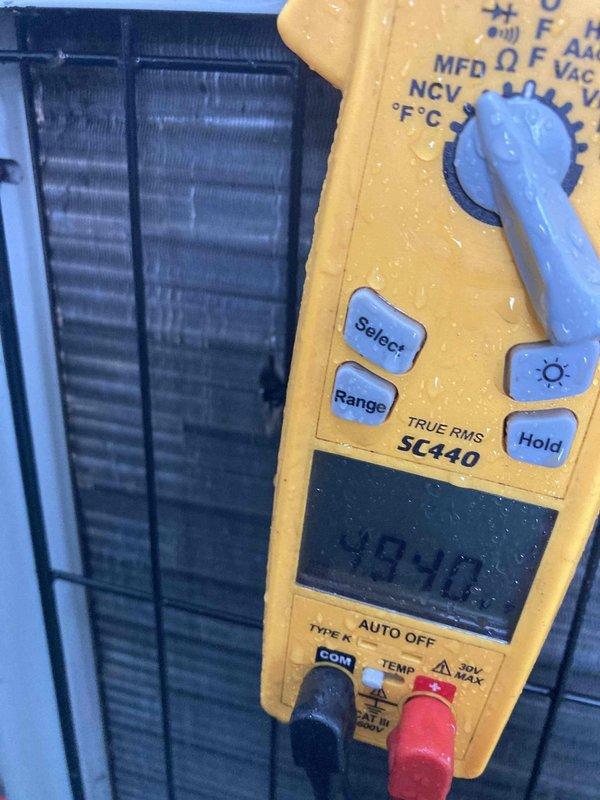 Completed annual air conditioning maintenance and tune-up on residential AC system. Performed comprehensive system inspection, tested electrical components and refrigerant temperatures using digital multimeter at outdoor condenser unit, verified proper operation of all system components. No issues found; system operating within normal parameters.