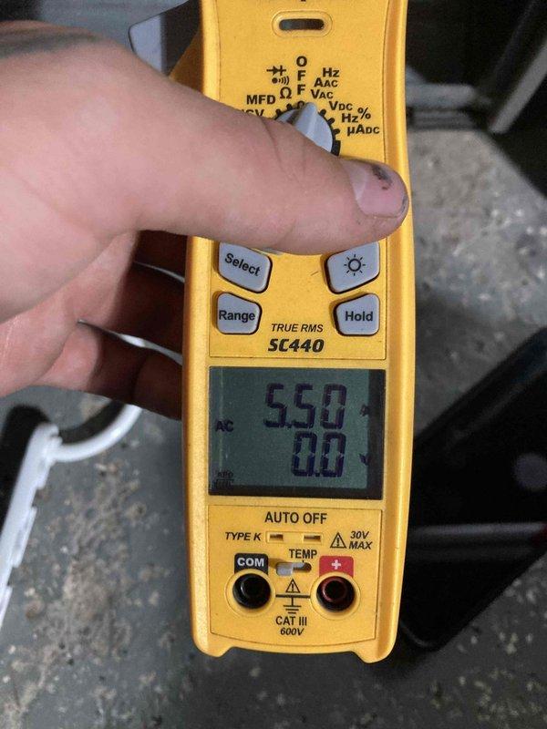 Completed annual air conditioning maintenance and tune-up on residential AC system. Performed comprehensive system inspection, tested electrical components and refrigerant temperatures using digital multimeter at outdoor condenser unit, verified proper operation of all system components. No issues found; system operating within normal parameters.