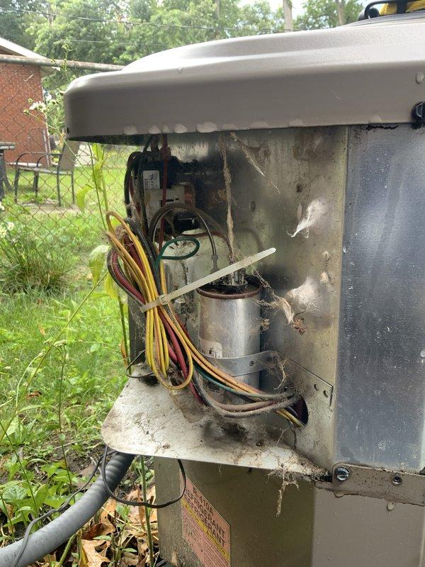 Responded to a no-cool call on a 10+ year old residential air conditioning system experiencing refrigerant line frosting while still maintaining cooling capability. Upon arrival, performed comprehensive system inspection revealing significant moisture damage and rust accumulation in the indoor air handler base pan, indicating prolonged exposure to condensate and possible drainage issues. Outdoor condensing unit showed signs of extended service life with dirt accumulation, aged wiring connections, and general wear throughout the cabinet.

Conducted complete system tune-up as requested, including cleaning condenser coils, inspecting all electrical connections and components, and checking capacitor values. Evaluated refrigerant charge and system pressures to address the frosting condition on refrigerant lines. Examined airflow at indoor unit, checking for restrictions that could contribute to evaporator coil icing. Inspected condensate drainage system due to evidence of water intrusion in