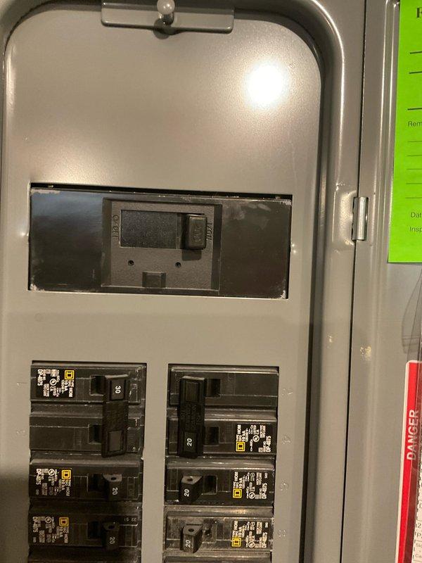 Performed electrical estimate for Kohler generator installation serving residential property. Assessed existing electrical panel capacity and circuit breaker configuration to determine compatibility with 4-6 kW generator system. Documented current electrical infrastructure including main service panel layout and available breaker positions for generator transfer switch integration. Evaluated kitchen appliance load requirements, noting gas range with electronic ignition and microwave installation that will require continuous power protection during utility outages. Confirmed adequate clearances and mounting locations for automatic transfer switch equipment and provided technical specifications for generator interconnection with existing electrical distribution system.