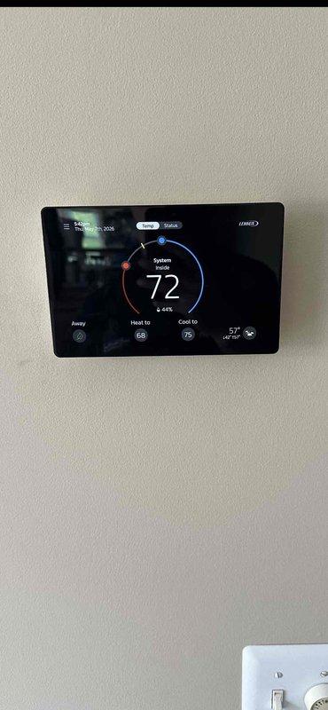 Successfully completed a full HVAC system installation including a 110,000 BTU Lennox furnace and 3-ton air conditioning unit positioned in the left side yard. The installation encompassed all mechanical and electrical connections, with proper PVC condensate drainage lines, copper refrigerant piping, metal ductwork integration, and a new programmable smart thermostat programmed and operational for heating and cooling control.